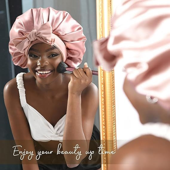 Dusty pink satin bonnet with tie band, worn and flat lay